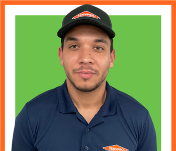 Fabian, SERVPRO employee in uniform, cut out in front of white background