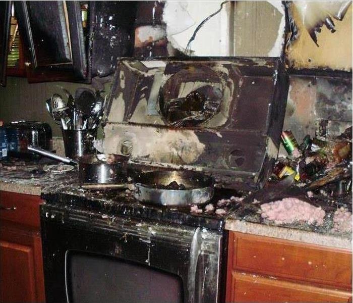 fire damage in a kitchen after cooking fire in Orlando, FL